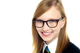 Closeup shot of smiling schoolgirl in eyeglasses