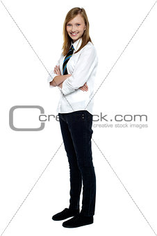 Confident high school girl posing with folded arms