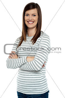 Cheerful lady in casual wear striking a pose