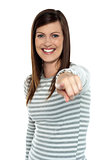Woman pointing her finger towards the camera