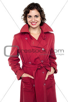 Young fashion female wearing trendy topcoat