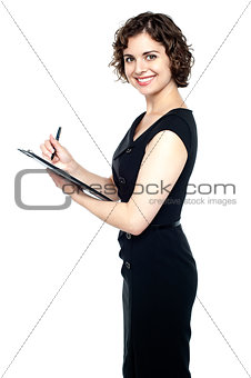 Gorgeous young female with a writing pad