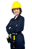 Confident young woman in jumpsuit