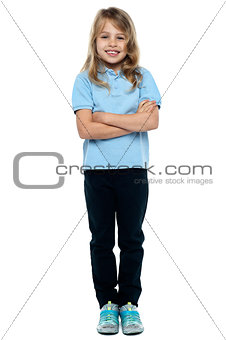 Pretty girl in casuals posing with folded arms
