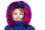Cheerful young girl in hooded fur jacket
