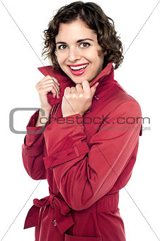 Cheerful young female in fashionable attire