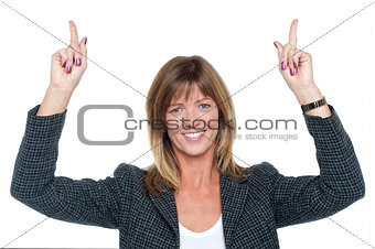 Lovely corporate woman with raised arms