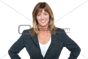 Business executive with hands on her waist
