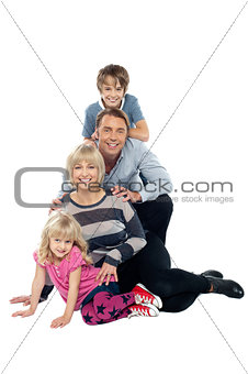 Closely bonded family in a studio