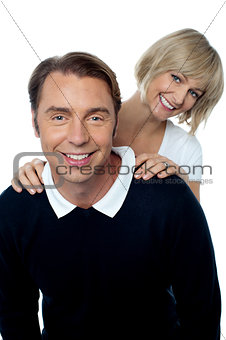 Love couple posing casually in front of camera