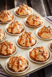 Caramel cupcakes on a baking tray