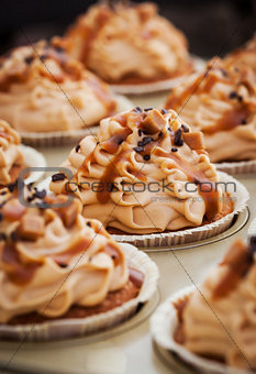 Caramel cupcakes on a baking tray