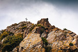 Cross on a stone mountain, Christian symbol