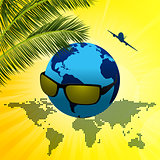 Planet Earth with sunglasses on summer background