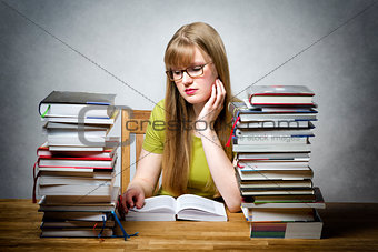 young woman is reading book