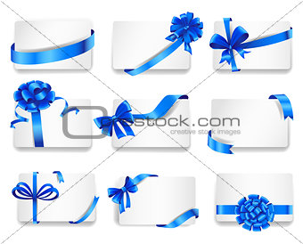 Set of beautiful cards with blue gift bows.