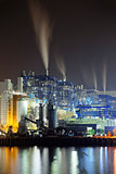 power station at night with smoke
