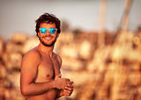 Handsome guy on the beach