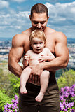 Athletic father with lovely little daughter 