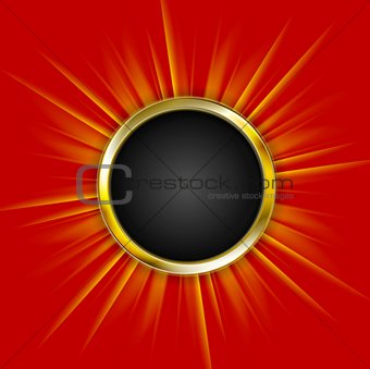 Golden circle and beams on red background