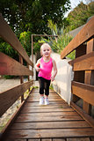 Portrait of fitness baby girl outdoors