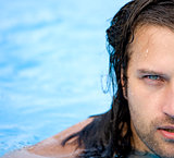 beautiful man in water pool