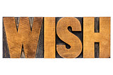 wish word typography in wood type