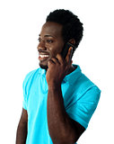 African guy communicating via cellphone