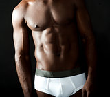 Naked underwear male model closeup shot