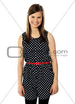 Pretty cheerful trendy teenager posing