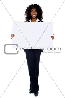 Corporate woman displaying white ad board