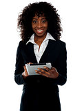 Young businesswoman using wireless tablet pc