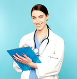 Medical expert writing patients prescription