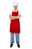 Handsome young cook posing in uniform