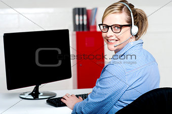 Portrait of cheerful customer support executive