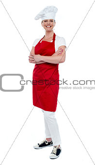 Full length portrait of pretty female cook
