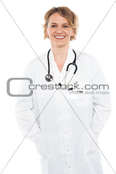 Beautiful female physician in white uniform