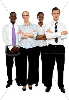 Young attractive business people. Arms folded