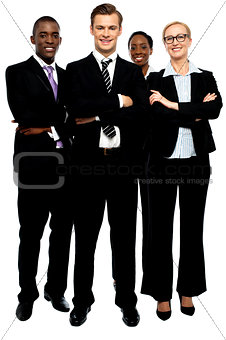 Group of business people, arms crossed