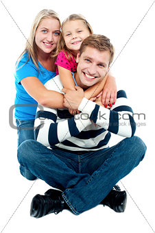 Happy young family, the adorable three