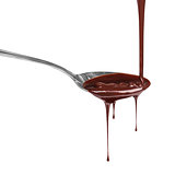 chocolate syrup leaking from spoon on white background with clip