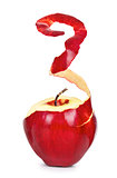 ripe red apple with peeled skin on a white background