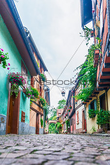 alley with colorful houses in alsace