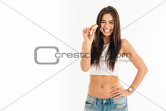 Young attractive woman holding sushi with her fingers