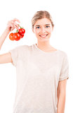Beaitiful woman holding red tomatos