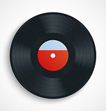 Black vinyl record disc with blank label in red