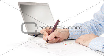 Image of male hand pointing at business document
