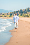 a gentle stroll along the beach barefoot