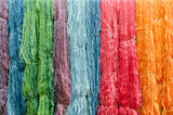 colorful silk yarns being dried
