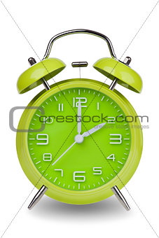 Green alarm clock with hands at 2 am or pm
